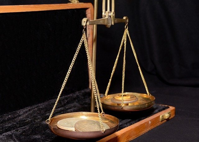 Scale balancing money