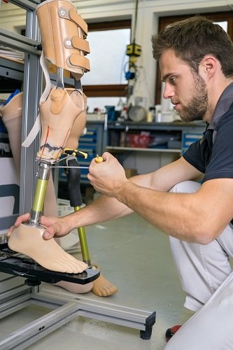 Man working on Prosthetic Leg