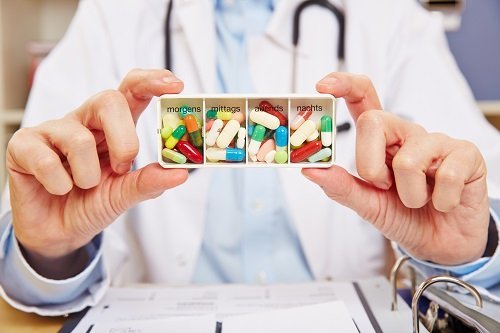 Doctor with opioid painkillers