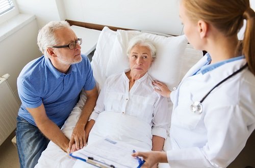 Doctor comforts her patient