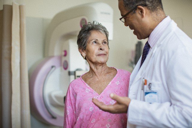 Doctor talking with patient