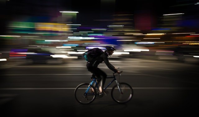 man on a bike at night