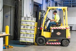 Man using forklift at work