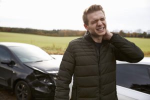 Man with neck pain after a car accident