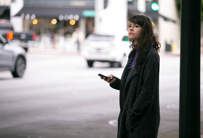 Rideshare Passenger Awaiting Car