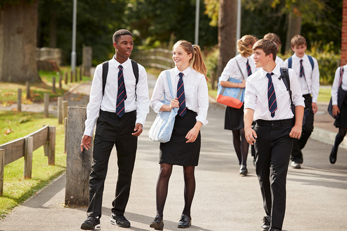 Teens walking to school