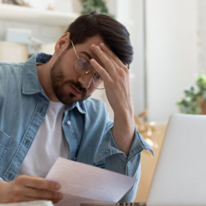 man reading data breach letter