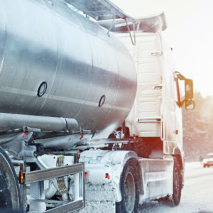 Semi truck driving in snow